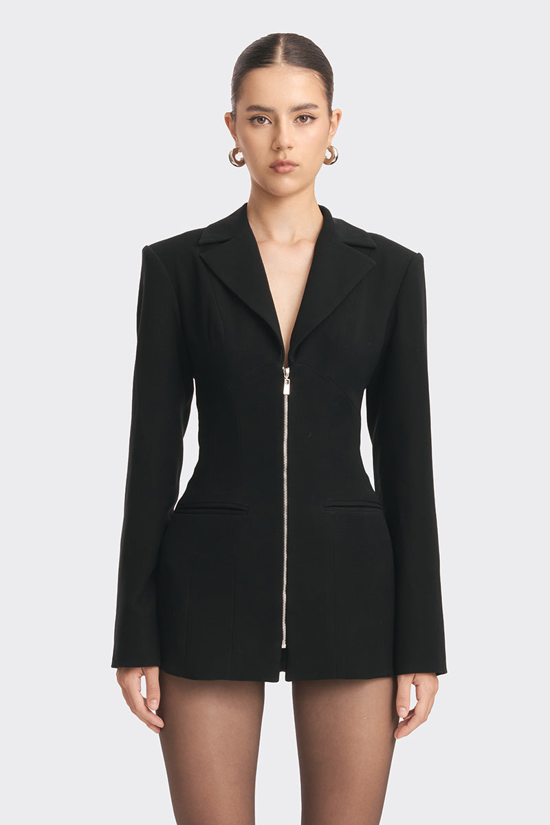 Black open-back suit jacket by Stolen Stores, featuring a stylish curved design and tailored fit for modern fashion.