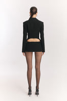 Black open-back suit jacket by Stolen Stores, stylish tailored jacket with sleek design and modern fit, perfect for formal or chic occasions.