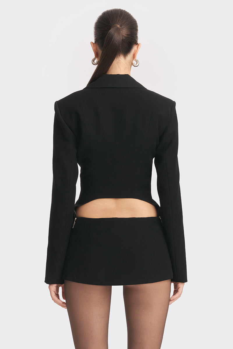 Black open back suit jacket from Stolen Stores' Curve collection, featuring a tailored fit and stylish design.