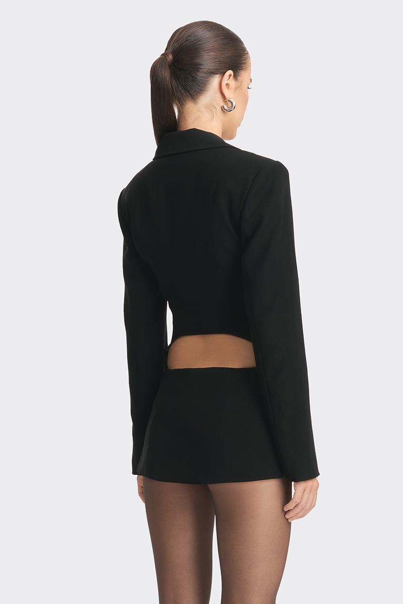 Black open-back suit jacket by Stolen Stores, featuring a sleek silhouette and tailored fit, perfect for stylish formal or casual wear.