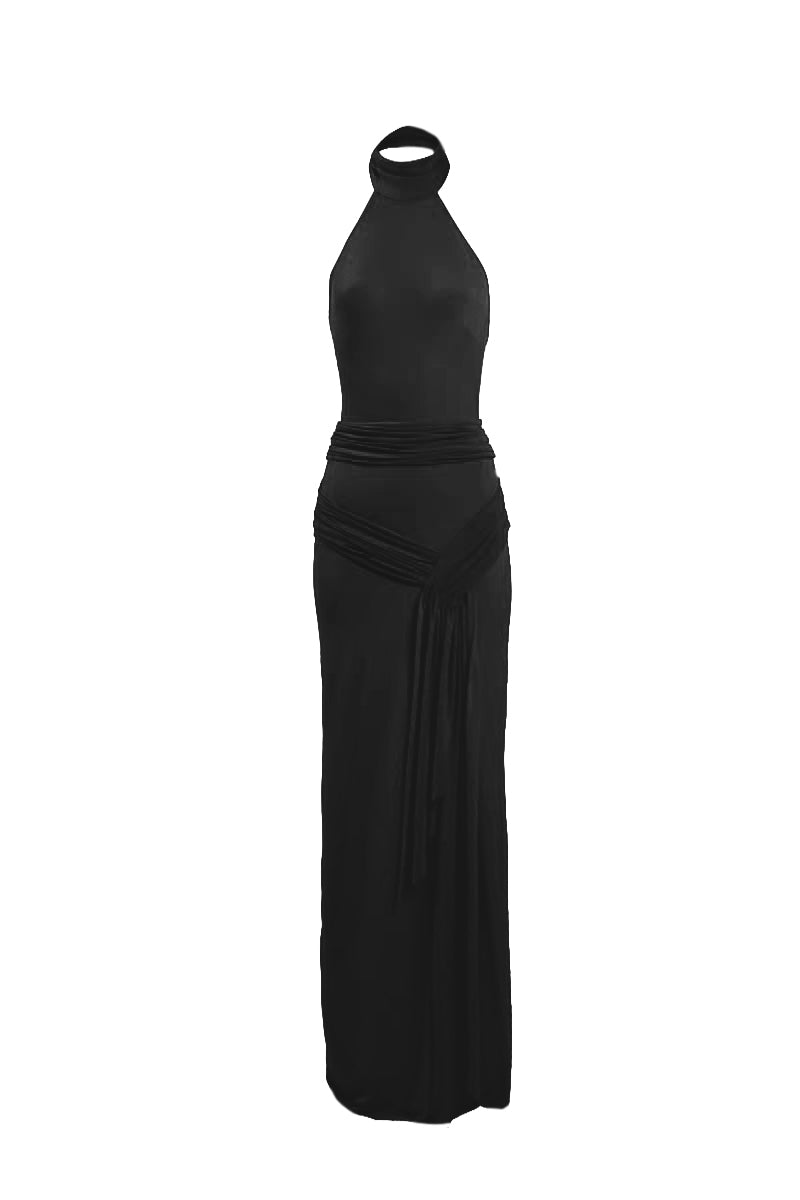 Black curve gown by Yassmin Saleh featuring a flowing maxi dress design with a ghostly front overlay.