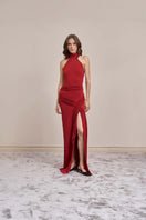 Red YASSMIN SALEH Curve Gown maxi dress with a fitted bodice and flowing skirt, displayed from the front.