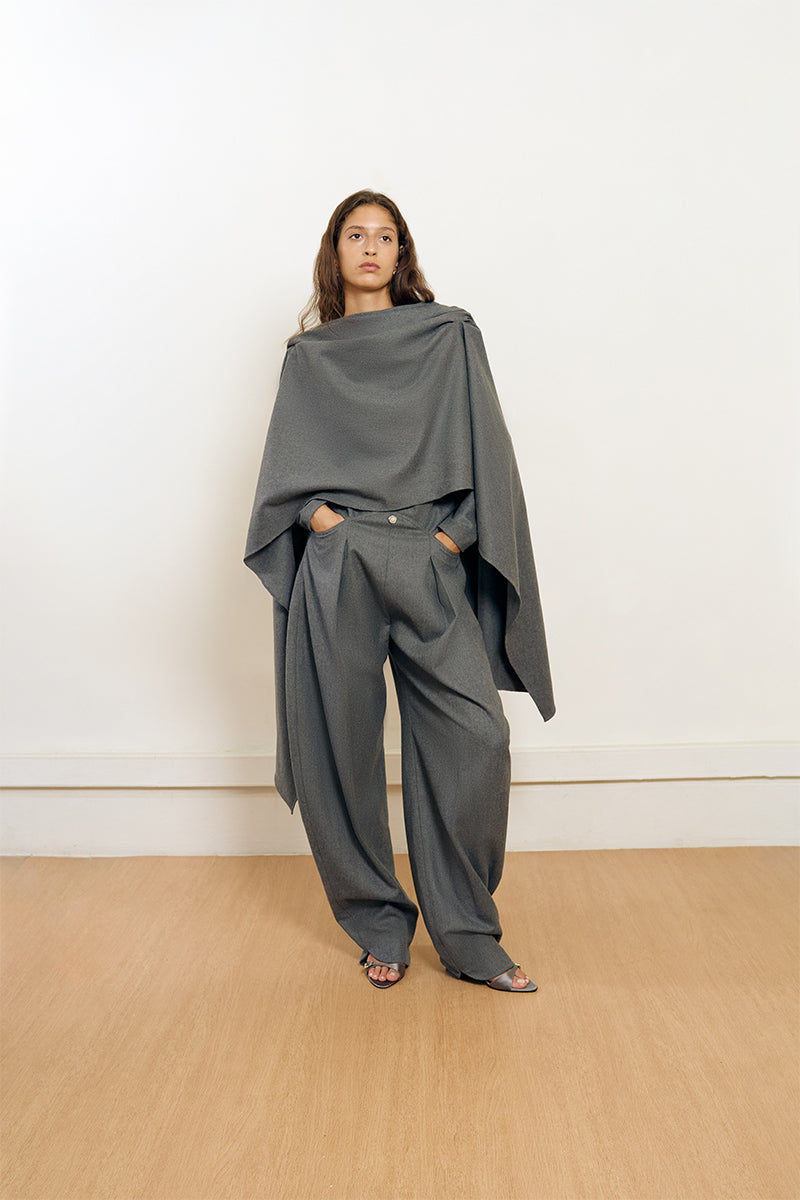Gray Curve Wool Pants by Yassmin Saleh, front view showing tailored fit and waistband detail.