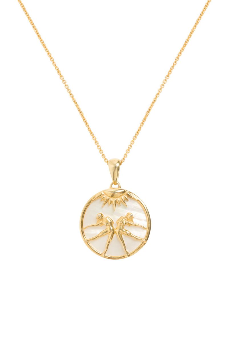 Gold plated Gemini zodiac necklace by Freya Rose featuring a pendant with Gemini constellation design on a delicate chain
