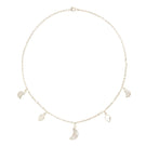 Silver petite moon necklace from Freya Rose, featuring a delicate moon pendant on a fine chain, ideal for subtle jewelry accents.