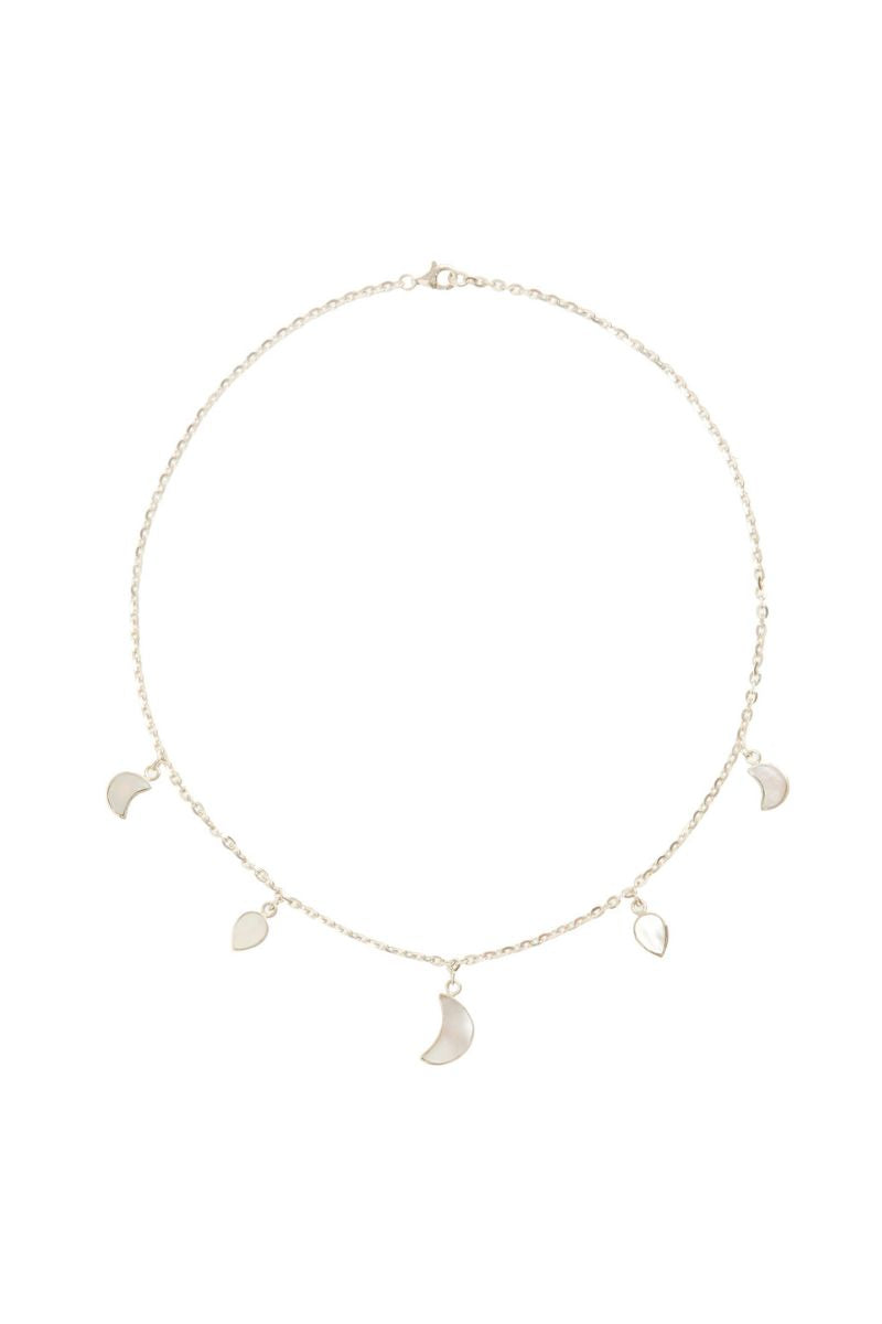 Silver petite moon necklace from Freya Rose, featuring a delicate moon pendant on a fine chain, ideal for subtle jewelry accents.