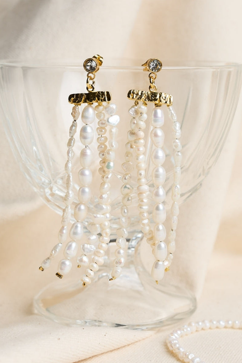 LAVANI JEWELS Cyra Fringe Earrings featuring gold-tone metal with intricate fringe design and dangling elements.