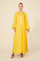 Bocan Couture Nora long buttoned saffron nightgown with elegant design and flowing fabric.