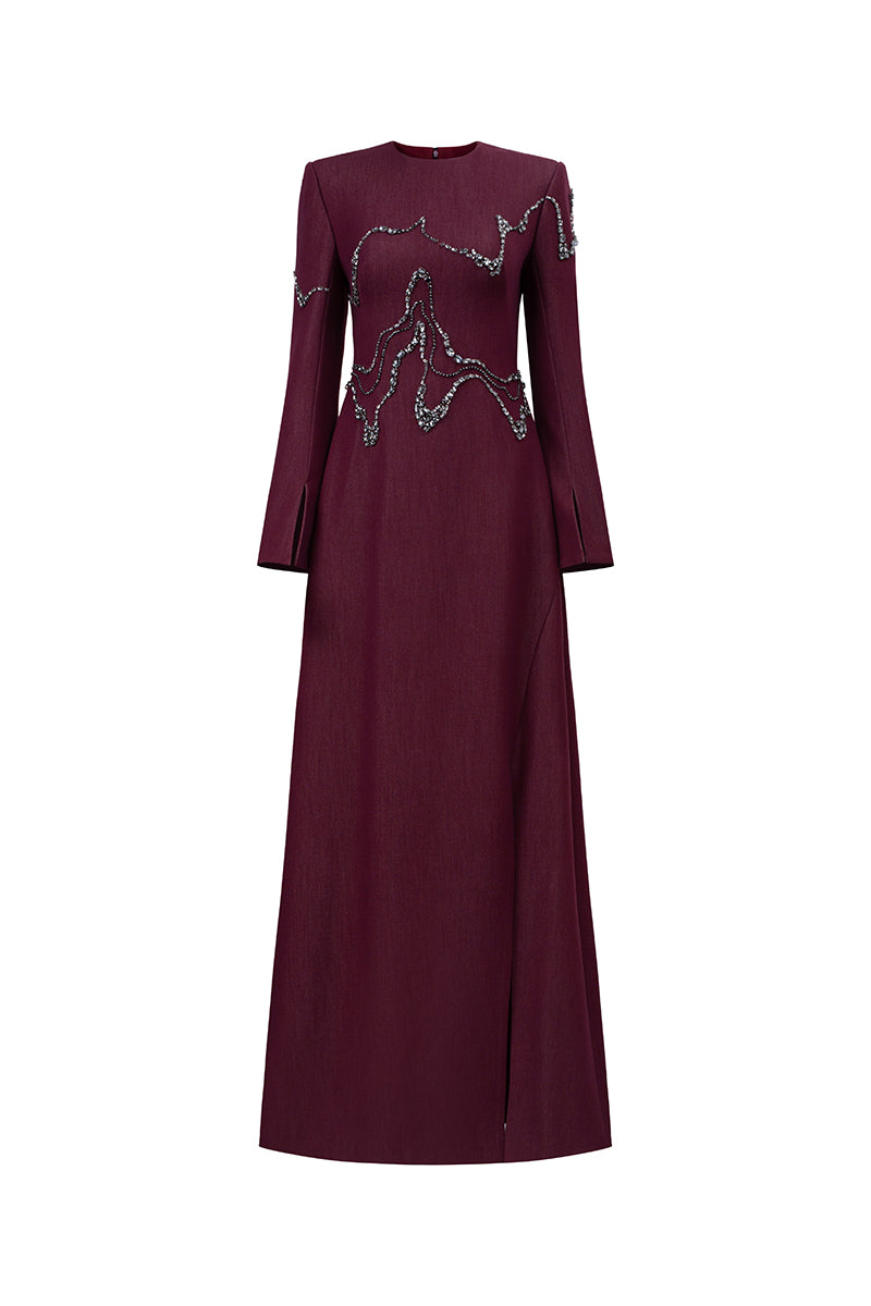 Long sleeve ox embroidered gown by GVLUX featuring intricate embroidery and elegant design.