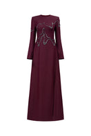 Long sleeve ox embroidered gown by GVLUX featuring intricate embroidery and elegant design.