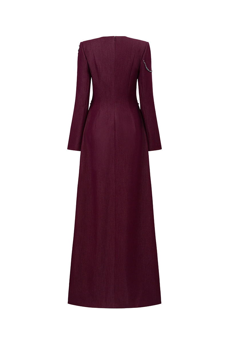 Long sleeve ox embroidered gown by GVLUX featuring intricate embroidery and elegant design, perfect for formal occasions.
