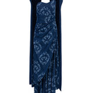 Navy blue CAPE NECK GOWN by GVLUX, elegant evening gown with cape detail, shown on a model in a formal setting.