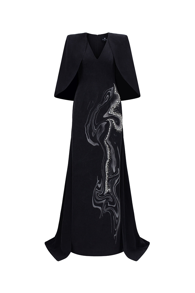Elegant midnight firework-themed V-neck gown by GVLUX featuring intricate detailing and flowing fabric.