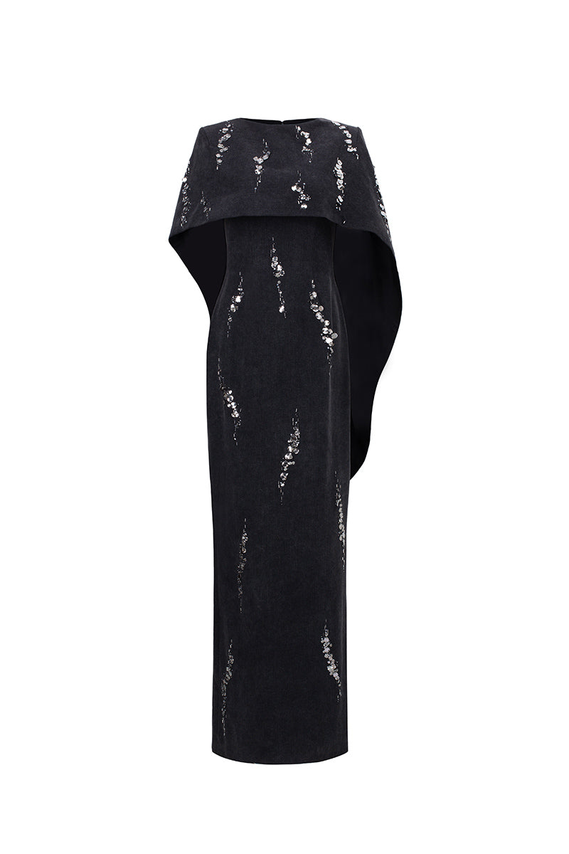 GVLUX Midnight Fireworks Cape Gown displayed on a model, showcasing the elegant design and flowing fabric of this stylish gown.