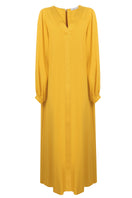 Bocan Couture NORA long buttoned saffron nightgown with a flowing design and elegant neckline, perfect for sleepwear or loungewear.