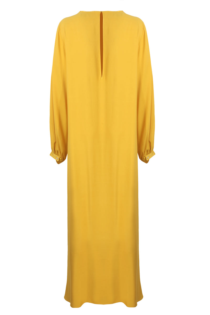 Bocan Couture Nora long buttoned saffron nightgown with long sleeves and a relaxed fit, displayed on a mannequin.