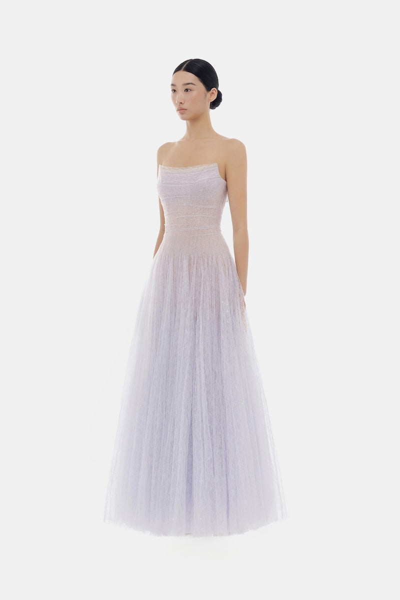 Violet draped lace maxi gown by Montsand, featuring elegant flowing fabric and intricate lace details, perfect for formal occasions.