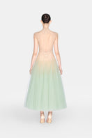 Mint ombré cut-out lace gown by Montsand, featuring intricate lace details and elegant design, shown on a model.