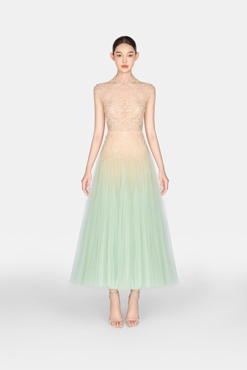 Mint ombré cut-out lace gown by Montsand featuring a flowing design and intricate lace details.