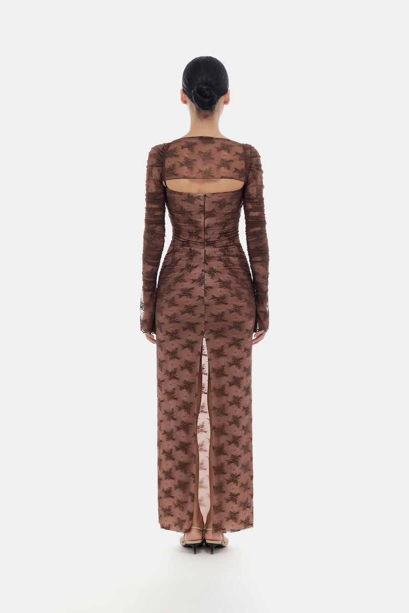 Brown bow cut-out laces maxi dress by Montsand, flowy fabric with stylish cut-outs and bow accents, perfect for elegant occasions.