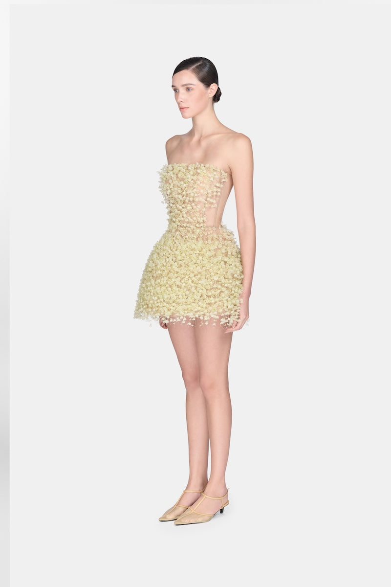 Montsand Lime Flowers mini dress featuring a vibrant floral pattern and lightweight fabric, perfect for spring and summer wear.