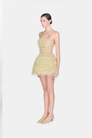 Montsand Lime Flowers mini dress featuring a vibrant floral pattern and lightweight fabric, perfect for spring and summer wear.