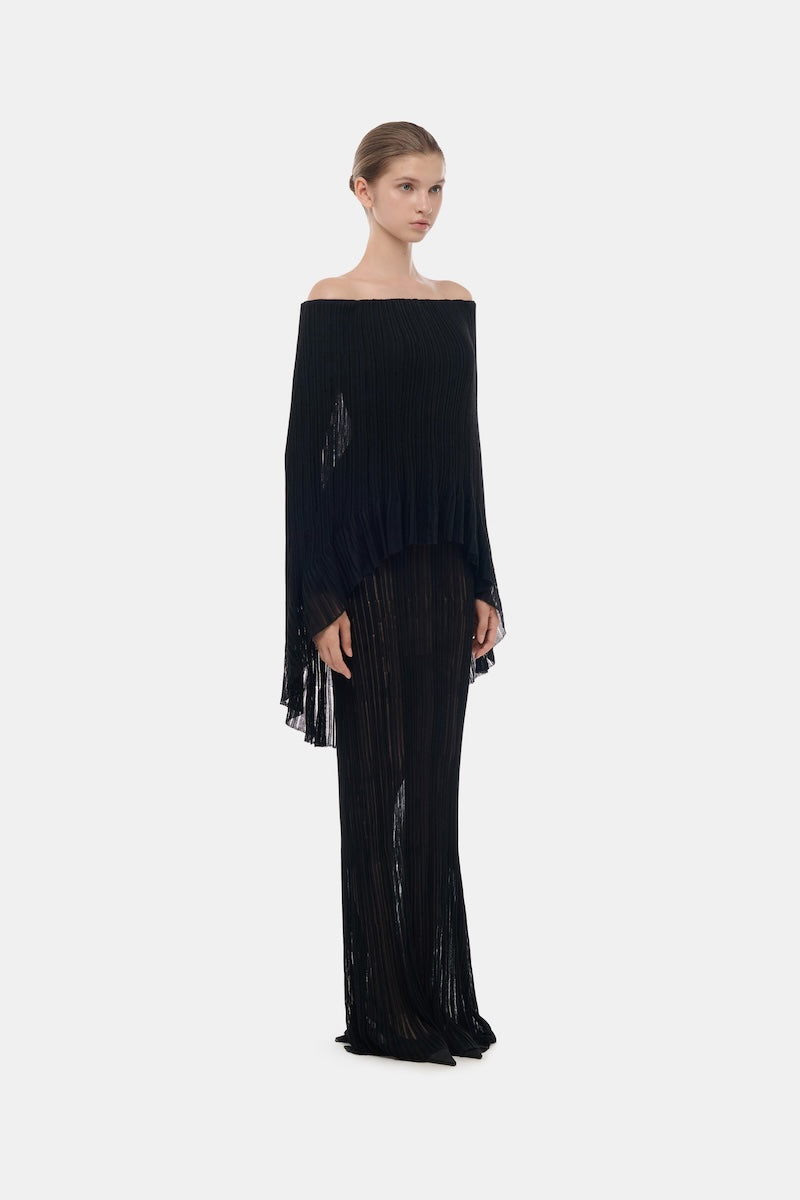 Black off-shoulder pleated maxi gown by Montsand featuring flowing fabric and elegant design, perfect for formal occasions.