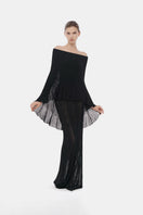 Black off-shoulder pleated maxi gown by Montsand, featuring flowing fabric and elegant design for formal occasions.