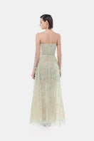 Montsand mint floral string maxi dress displayed on a hanger, featuring a flowing gown with floral print and adjustable straps.