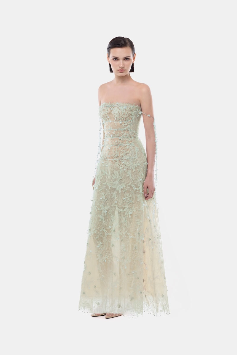 Mint floral string maxi dress by Montsand, featuring a flowing gown with a delicate floral pattern and adjustable straps.