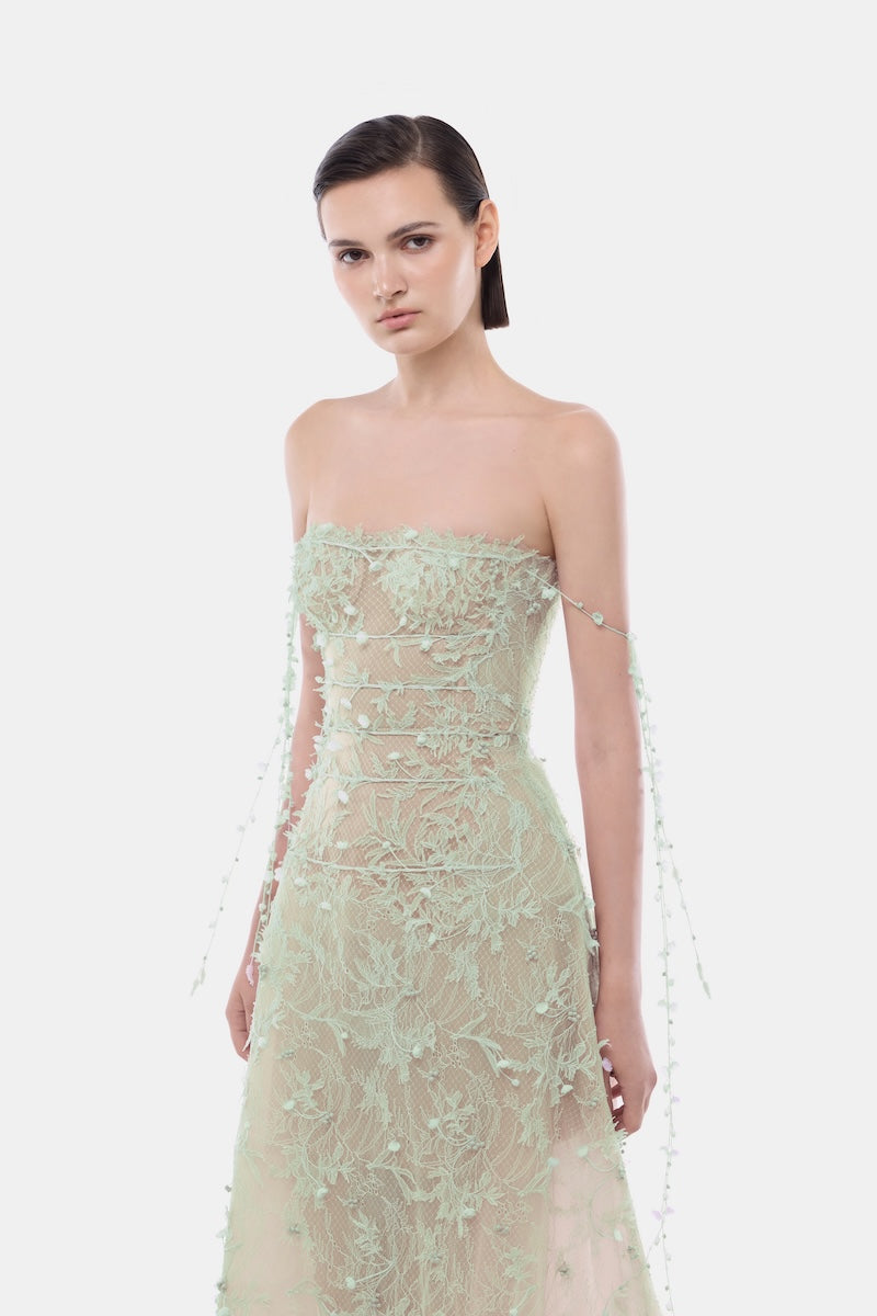 Mint floral string maxi dress by Montsand, flowing gown with delicate floral pattern and adjustable straps, perfect for summer occasions.