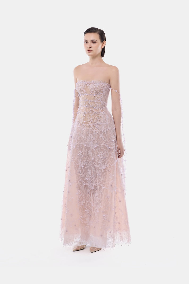 Violet floral string maxi gown by Montsand featuring a flowing design and elegant floral pattern.