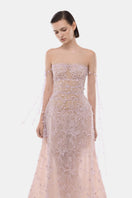 Violet floral print maxi gown by Montsand with flowing fabric and elegant design, perfect for formal occasions.