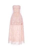 Blue floral maxi gown by Montsand featuring a flowing silhouette and vibrant violet floral pattern.