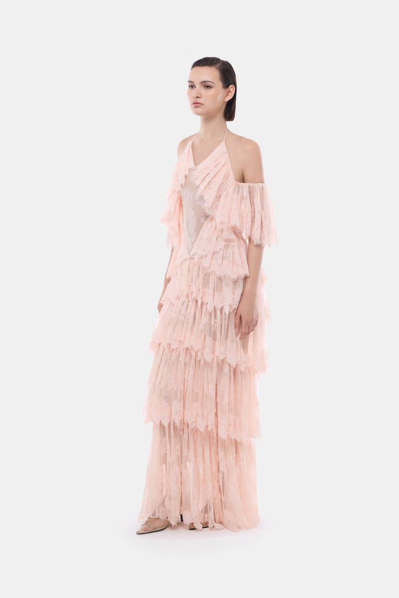 Montsand peach ruffled halter gown with layered fabric and elegant design, perfect for formal occasions.