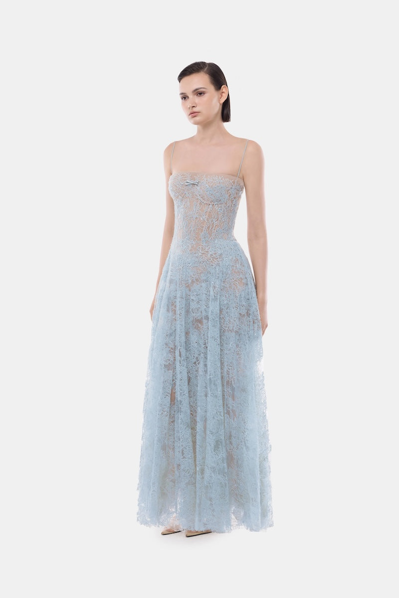 Elegant blue straight neckline pleat gown by Montsand, featuring a flowing design and sophisticated style.