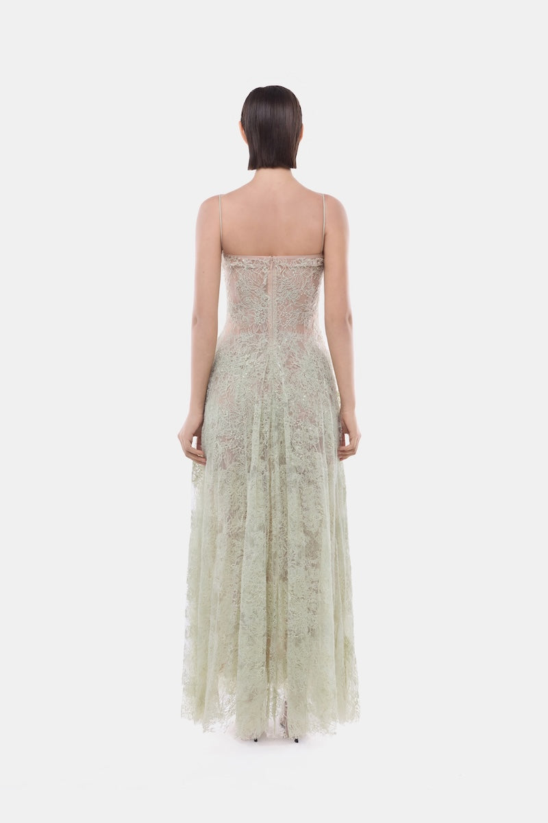 Mint green Montsand gown featuring a straight neckline and pleated skirt, elegant and flowing for formal occasions.