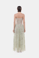 Mint green Montsand gown featuring a straight neckline and pleated skirt, elegant and flowing for formal occasions.