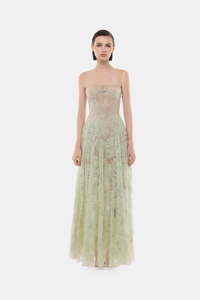 Montsand mint green straight neckline pleated gown displayed on a hanger, showcasing elegant flowy fabric and stylish design.