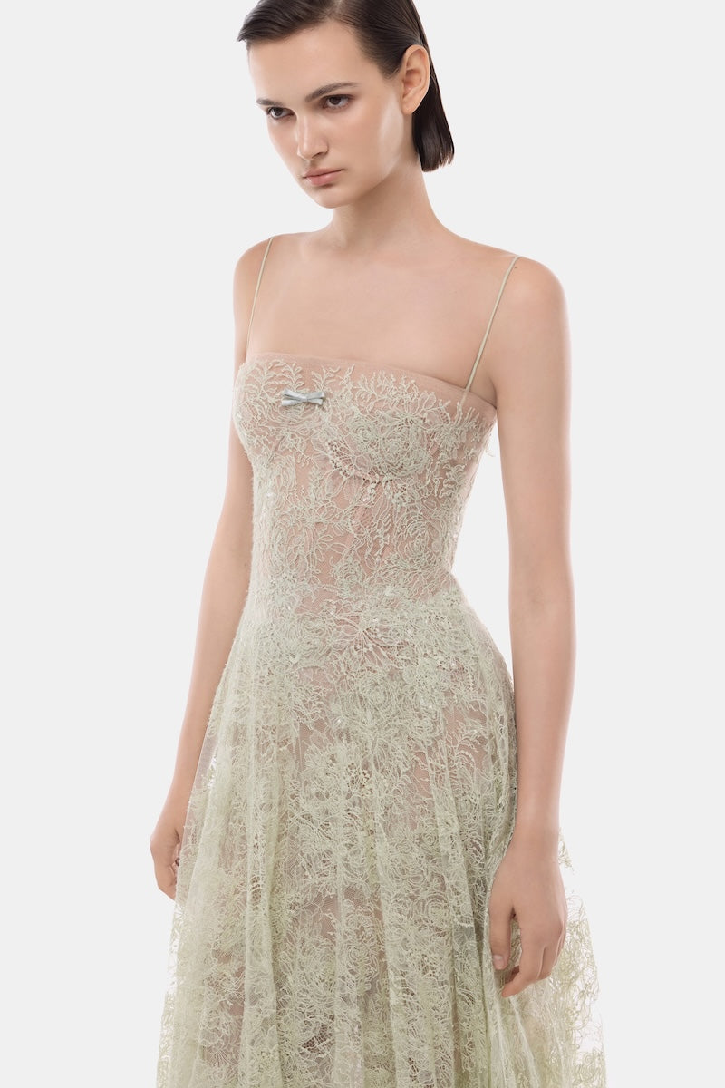 Mint green straight neckline pleat gown by Montsand, elegant floor-length dress with flowing pleats and a sleek silhouette.