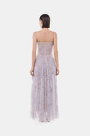 Elegant violet straight neckline pleat gown by Montsand, featuring a flowing design and subtle pleats, perfect for formal occasions.