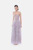 Violet straight neckline pleated gown by Montsand, flowing fabric with elegant pleats, perfect for formal occasions.