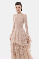 Elegant peach lace mullet gown by Montsand, featuring intricate lace details and a flowing hem for formal occasions.