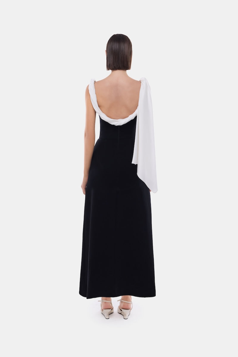 Black scarf midi dress by Montsand featuring a low back design, flowing fabric, and elegant silhouette.