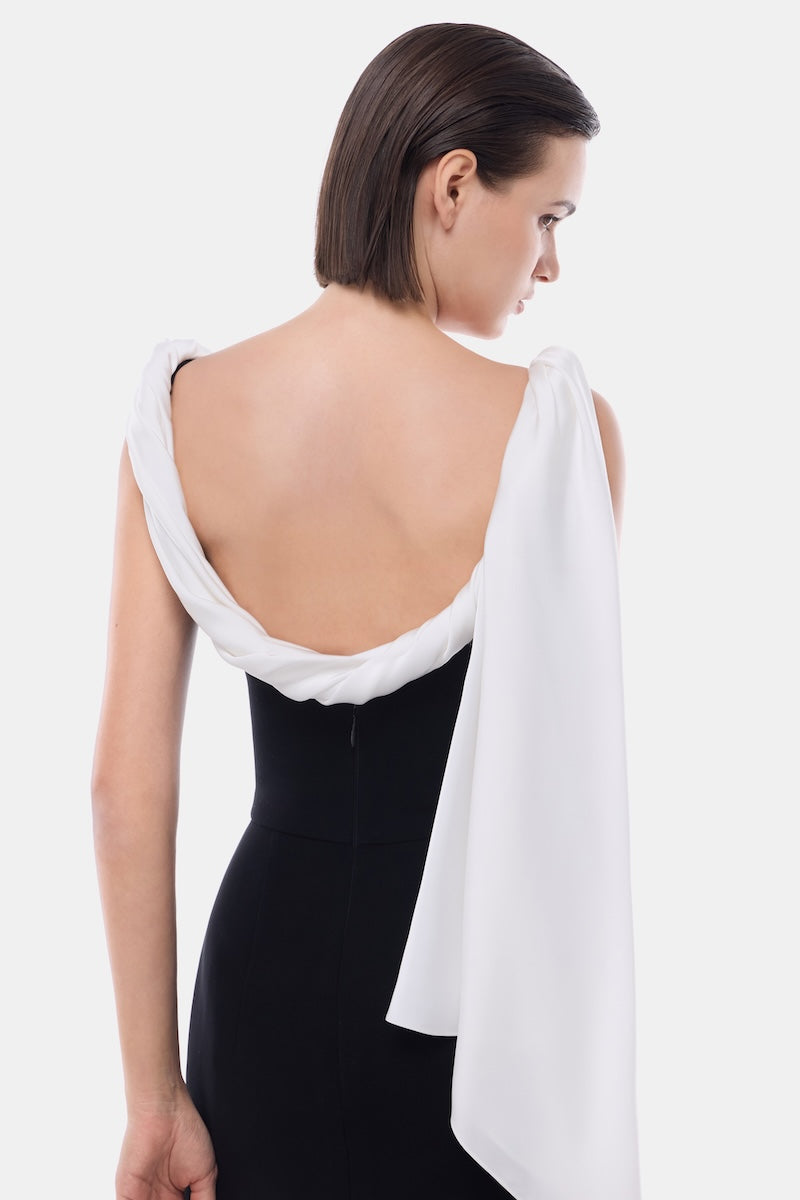 Black scarf detail on Montsand midi dress with low back design, showcasing elegant fabric and stylish silhouette.