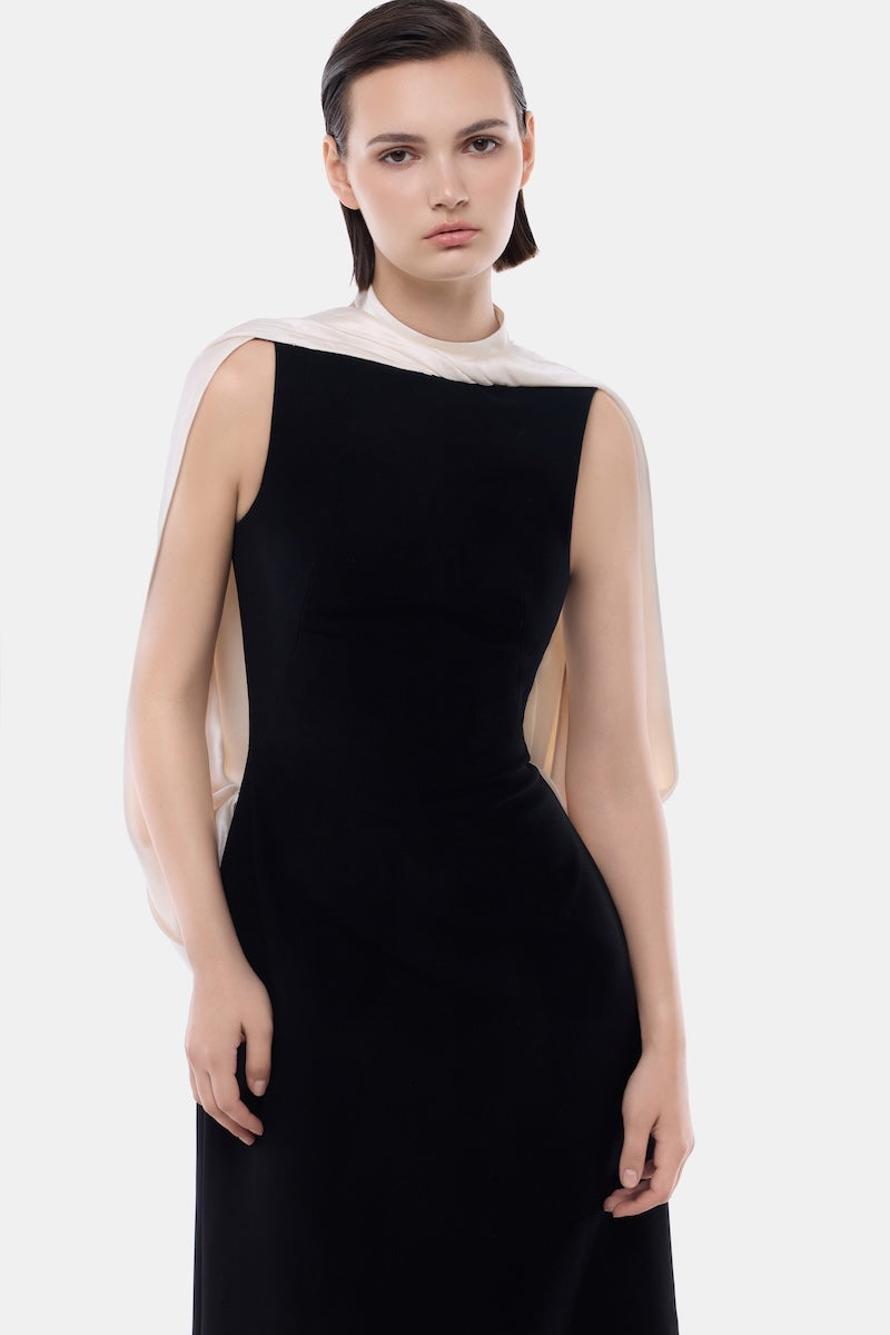 Black mock neck midi dress by Montsand featuring a stylish, fitted silhouette and elegant design.