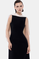 Black mock neck midi dress by Montsand featuring a stylish, fitted silhouette and elegant design.