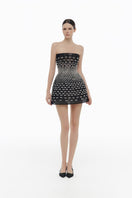 Black silver bow strapless mini dress by Montsand, featuring a fitted silhouette and stylish design for evening wear.