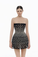Black silver bow strapless mini dress by Montsand, featuring a fitted silhouette and stylish bow detail at the bust.