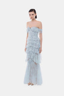 Blue lace ruffle strap off-shoulder gown by Montsand with delicate lace details and flowing ruffle accents.
